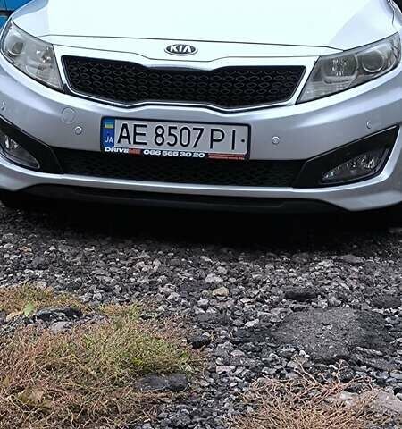 Серый Киа K5, объемом двигателя 2 л и пробегом 247 тыс. км за 8500 $, фото 1 на Automoto.ua