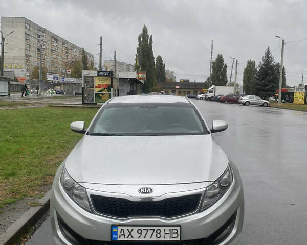 Серый Киа K5, объемом двигателя 2 л и пробегом 370 тыс. км за 8300 $, фото 1 на Automoto.ua