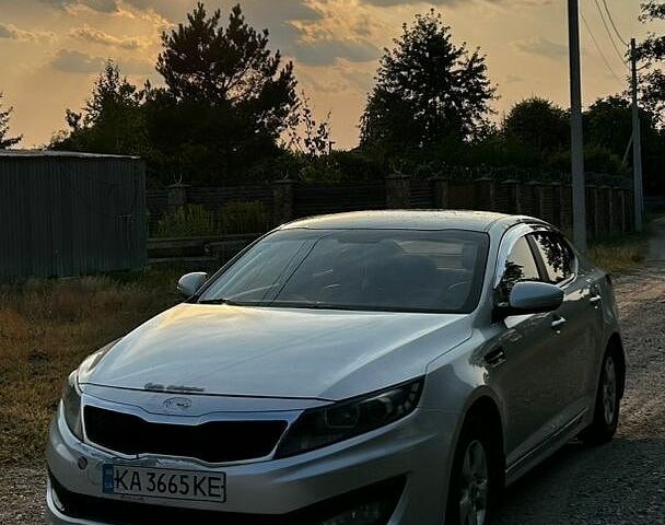 Серый Киа K5, объемом двигателя 2 л и пробегом 367 тыс. км за 5400 $, фото 1 на Automoto.ua