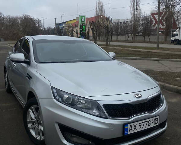 Серый Киа K5, объемом двигателя 2 л и пробегом 363 тыс. км за 7800 $, фото 1 на Automoto.ua