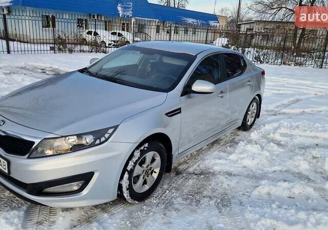 Сірий Кіа K5, об'ємом двигуна 2 л та пробігом 318 тис. км за 8600 $, фото 1 на Automoto.ua