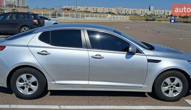 Серый Киа K5, объемом двигателя 2 л и пробегом 308 тыс. км за 6500 $, фото 1 на Automoto.ua