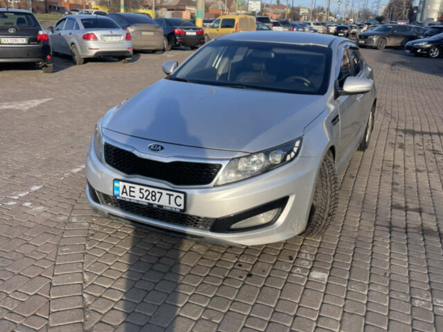 Серый Киа K5, объемом двигателя 2 л и пробегом 176 тыс. км за 7500 $, фото 1 на Automoto.ua