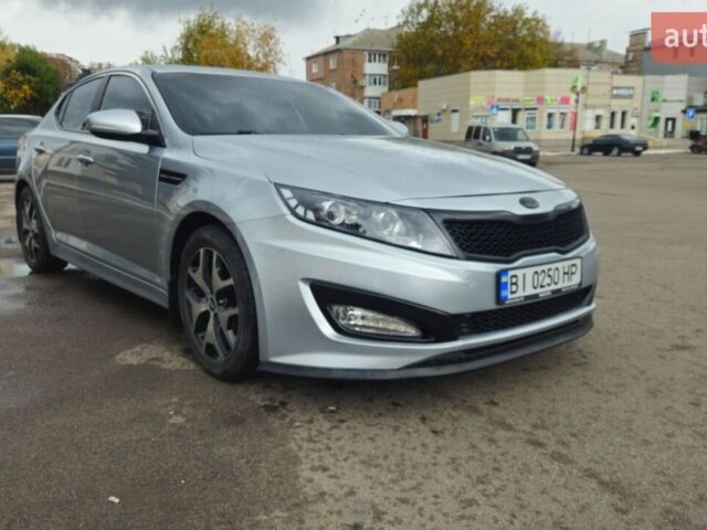 Сірий Кіа K5, об'ємом двигуна 2 л та пробігом 259 тис. км за 7700 $, фото 1 на Automoto.ua