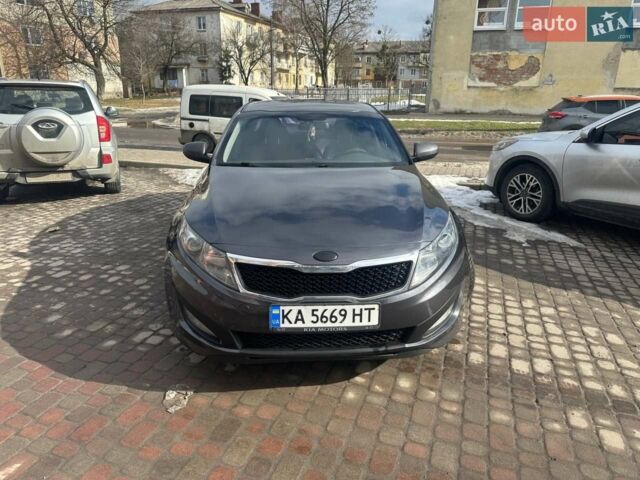 Серый Киа K5, объемом двигателя 2 л и пробегом 252 тыс. км за 8000 $, фото 1 на Automoto.ua