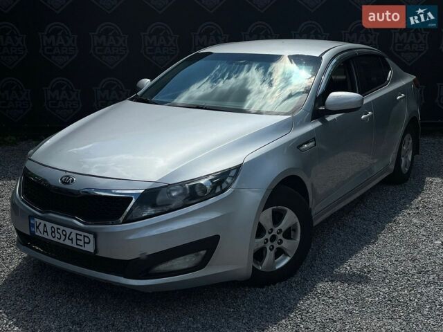 Серый Киа K5, объемом двигателя 2 л и пробегом 198 тыс. км за 6900 $, фото 1 на Automoto.ua