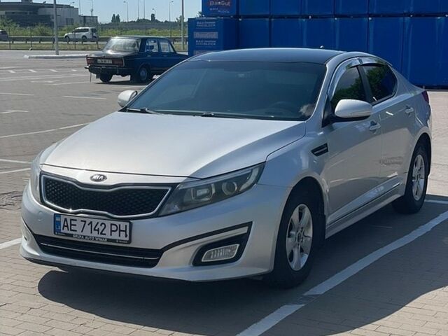 Серый Киа K5, объемом двигателя 2 л и пробегом 450 тыс. км за 8777 $, фото 1 на Automoto.ua