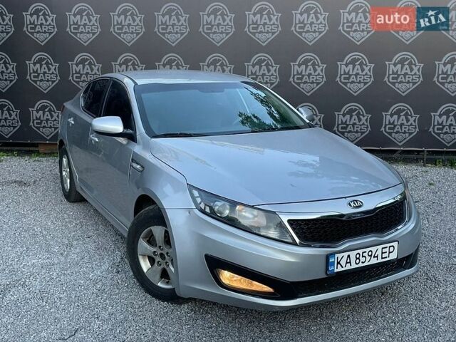 Серый Киа K5, объемом двигателя 2 л и пробегом 198 тыс. км за 6300 $, фото 1 на Automoto.ua