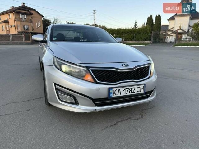 Серый Киа K5, объемом двигателя 2 л и пробегом 230 тыс. км за 7000 $, фото 1 на Automoto.ua