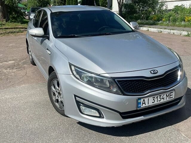 Серый Киа K5, объемом двигателя 2 л и пробегом 381 тыс. км за 7400 $, фото 1 на Automoto.ua