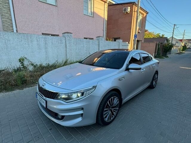Серый Киа K5, объемом двигателя 2 л и пробегом 295 тыс. км за 9000 $, фото 1 на Automoto.ua