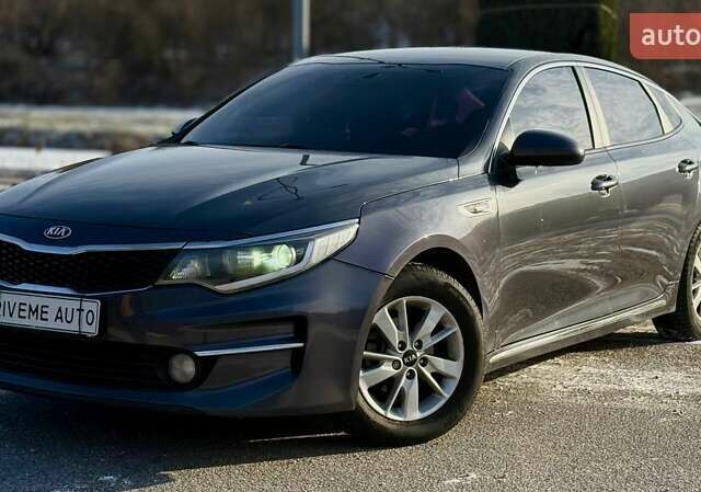 Серый Киа K5, объемом двигателя 2 л и пробегом 320 тыс. км за 9999 $, фото 1 на Automoto.ua