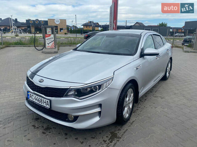 Серый Киа K5, объемом двигателя 2 л и пробегом 338 тыс. км за 12000 $, фото 1 на Automoto.ua
