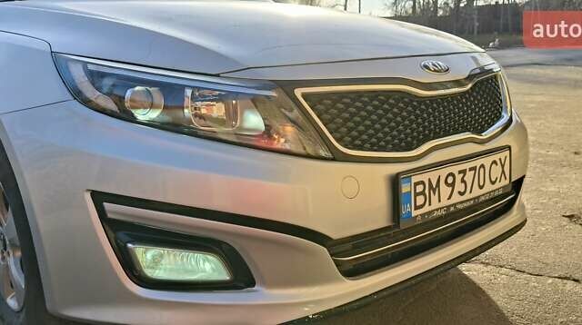 Серый Киа K5, объемом двигателя 2 л и пробегом 270 тыс. км за 8900 $, фото 1 на Automoto.ua