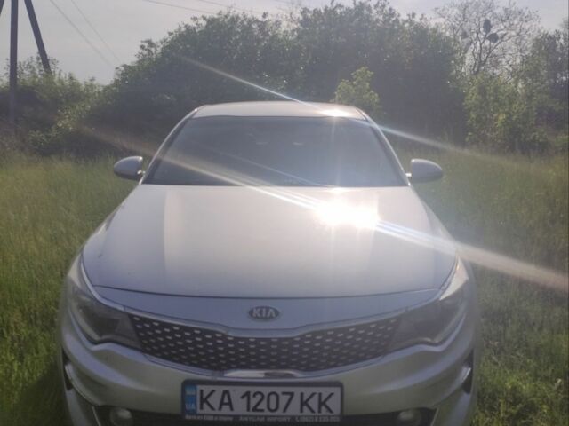 Серый Киа K5, объемом двигателя 2 л и пробегом 318 тыс. км за 8900 $, фото 1 на Automoto.ua