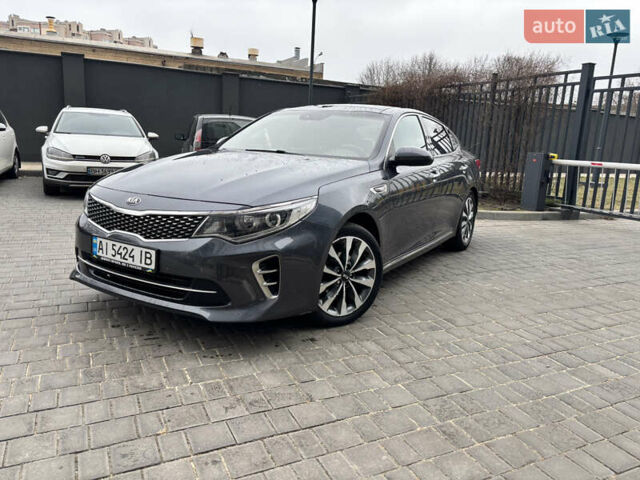 Серый Киа K5, объемом двигателя 2 л и пробегом 220 тыс. км за 11000 $, фото 1 на Automoto.ua