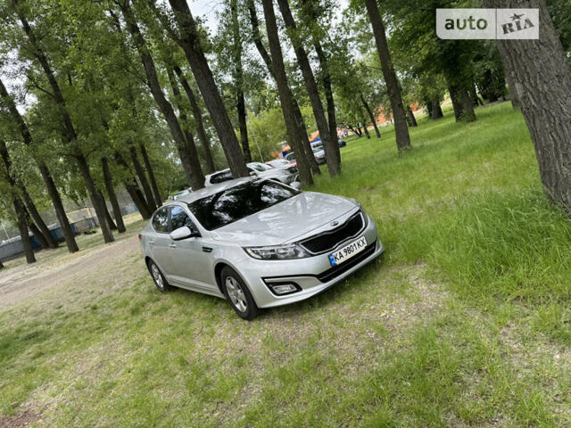 Серый Киа K5, объемом двигателя 2 л и пробегом 200 тыс. км за 9400 $, фото 1 на Automoto.ua