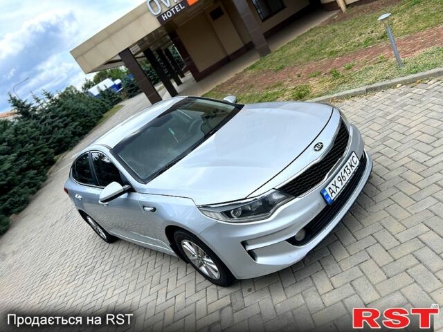 Серый Киа K5, объемом двигателя 2 л и пробегом 200 тыс. км за 9600 $, фото 1 на Automoto.ua