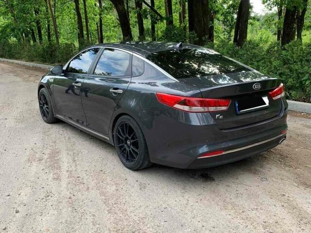 Серый Киа K5, объемом двигателя 2 л и пробегом 255 тыс. км за 12500 $, фото 1 на Automoto.ua
