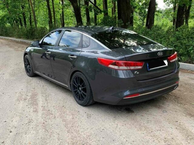 Серый Киа K5, объемом двигателя 2 л и пробегом 255 тыс. км за 12500 $, фото 1 на Automoto.ua