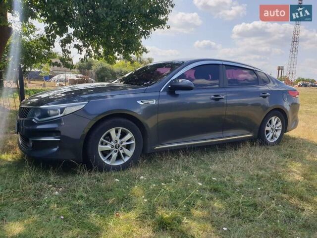 Серый Киа K5, объемом двигателя 2 л и пробегом 185 тыс. км за 12400 $, фото 1 на Automoto.ua
