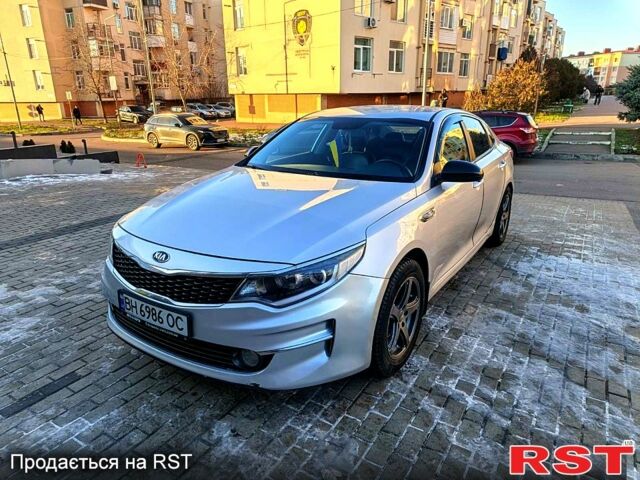 Серый Киа K5, объемом двигателя 2 л и пробегом 36600 тыс. км за 9500 $, фото 1 на Automoto.ua