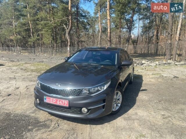 Серый Киа K5, объемом двигателя 2 л и пробегом 175 тыс. км за 12799 $, фото 1 на Automoto.ua