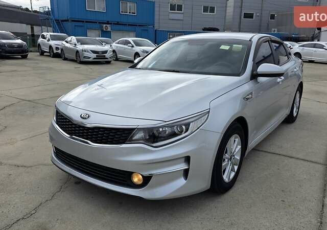 Серый Киа K5, объемом двигателя 2 л и пробегом 190 тыс. км за 12490 $, фото 1 на Automoto.ua