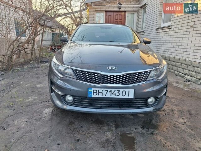 Серый Киа K5, объемом двигателя 2 л и пробегом 249 тыс. км за 12000 $, фото 1 на Automoto.ua
