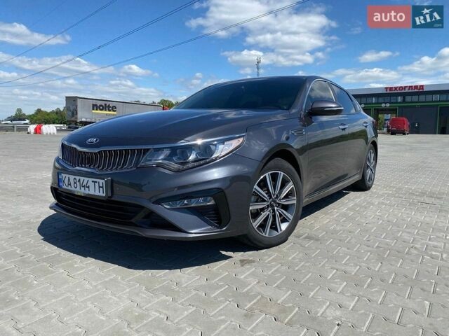 Серый Киа K5, объемом двигателя 2 л и пробегом 205 тыс. км за 16500 $, фото 1 на Automoto.ua