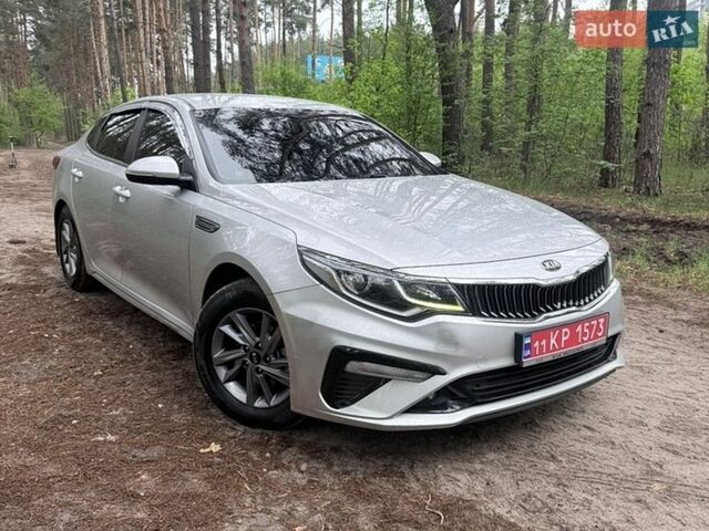 Серый Киа K5, объемом двигателя 2 л и пробегом 203 тыс. км за 12700 $, фото 1 на Automoto.ua