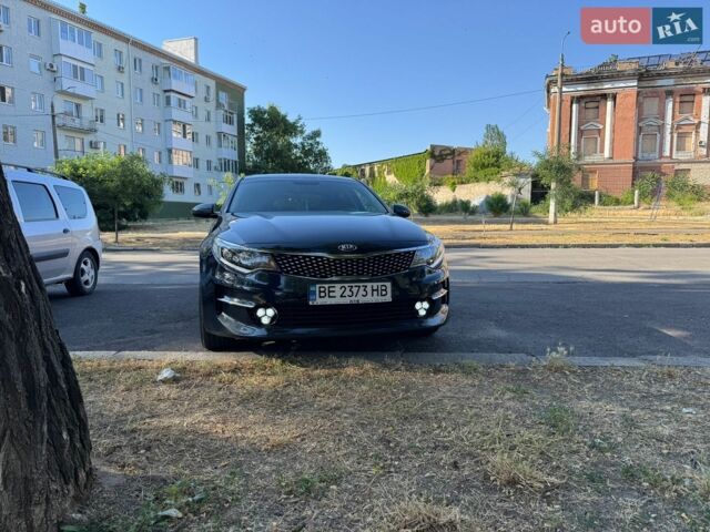 Синий Киа K5, объемом двигателя 2 л и пробегом 256 тыс. км за 13799 $, фото 1 на Automoto.ua