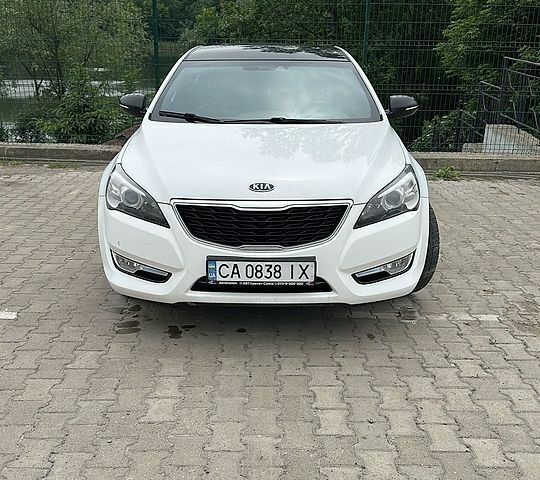 Белый Киа K7, объемом двигателя 2.66 л и пробегом 230 тыс. км за 10500 $, фото 1 на Automoto.ua