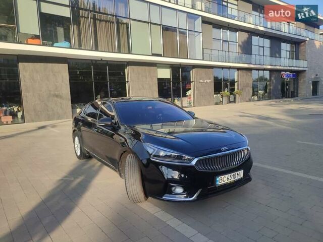 Черный Киа K7, объемом двигателя 3 л и пробегом 252 тыс. км за 13500 $, фото 1 на Automoto.ua