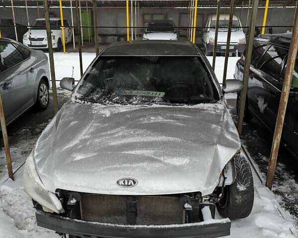 Серый Киа K7, объемом двигателя 2.66 л и пробегом 213 тыс. км за 3900 $, фото 1 на Automoto.ua