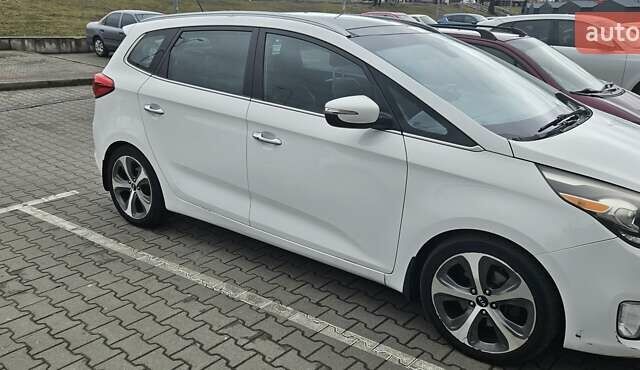 Білий Кіа Rondo, об'ємом двигуна 2 л та пробігом 188 тис. км за 9900 $, фото 1 на Automoto.ua