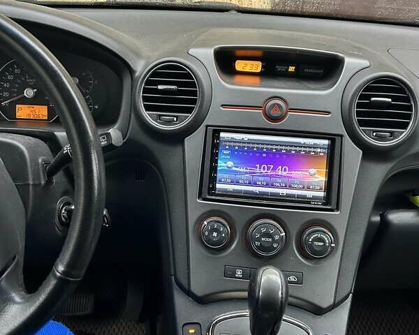 Сірий Кіа Rondo, об'ємом двигуна 2.36 л та пробігом 197 тис. км за 8500 $, фото 1 на Automoto.ua