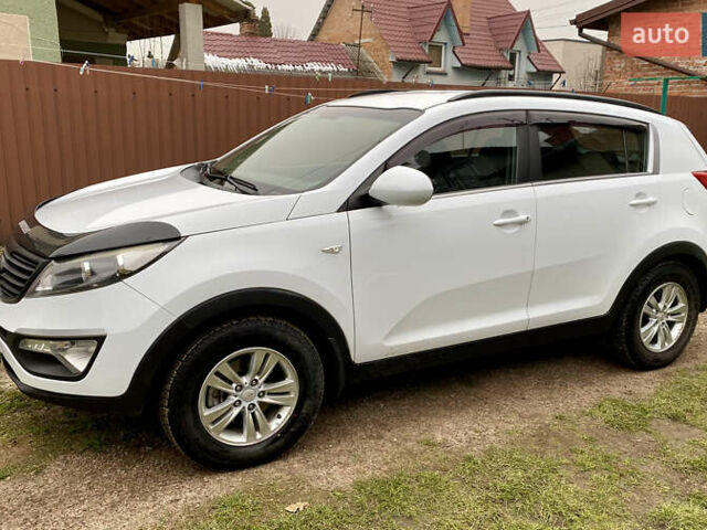 Белый Киа Sportage, объемом двигателя 2 л и пробегом 244 тыс. км за 9990 $, фото 1 на Automoto.ua