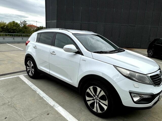 Білий Кіа Sportage, об'ємом двигуна 2 л та пробігом 164 тис. км за 12000 $, фото 1 на Automoto.ua