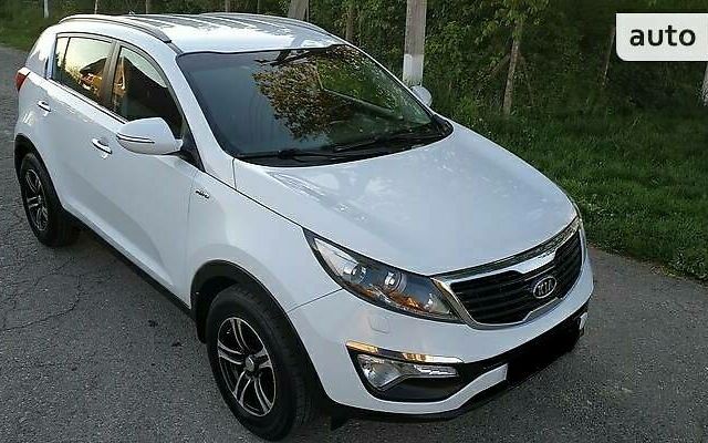 Белый Киа Sportage, объемом двигателя 2 л и пробегом 168 тыс. км за 14000 $, фото 1 на Automoto.ua