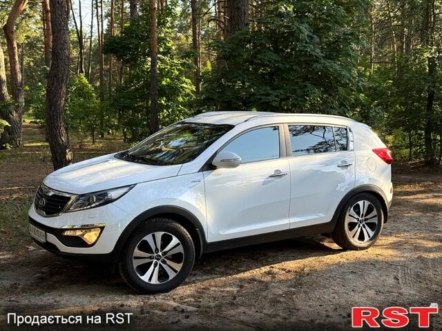 Білий Кіа Sportage, об'ємом двигуна 2 л та пробігом 82 тис. км за 15500 $, фото 1 на Automoto.ua