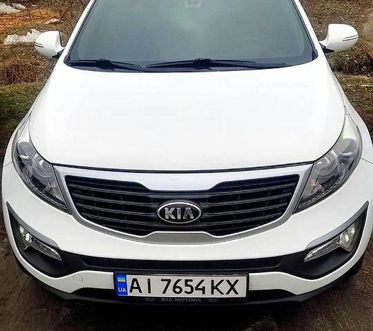 Белый Киа Sportage, объемом двигателя 2 л и пробегом 225 тыс. км за 13500 $, фото 1 на Automoto.ua