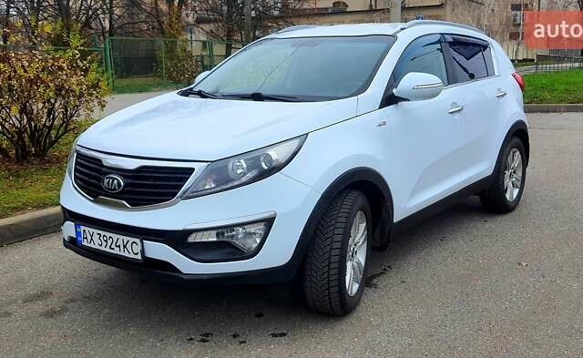Білий Кіа Sportage, об'ємом двигуна 2 л та пробігом 102 тис. км за 14700 $, фото 1 на Automoto.ua