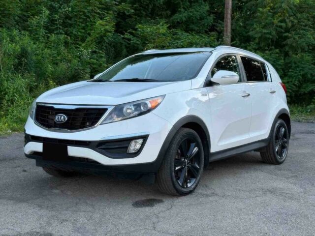 Белый Киа Sportage, объемом двигателя 2 л и пробегом 86 тыс. км за 7600 $, фото 1 на Automoto.ua