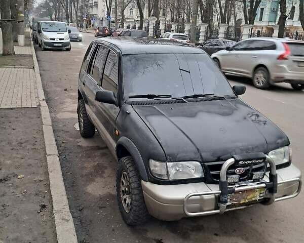 Черный Киа Sportage, объемом двигателя 2 л и пробегом 350 тыс. км за 3000 $, фото 1 на Automoto.ua