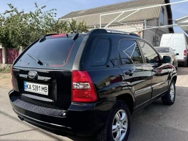 Черный Киа Sportage, объемом двигателя 2 л и пробегом 199 тыс. км за 6999 $, фото 1 на Automoto.ua