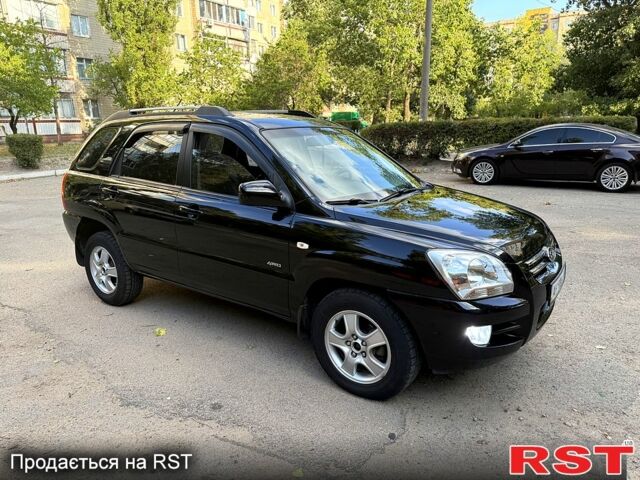 Черный Киа Sportage, объемом двигателя 2 л и пробегом 205 тыс. км за 7500 $, фото 1 на Automoto.ua