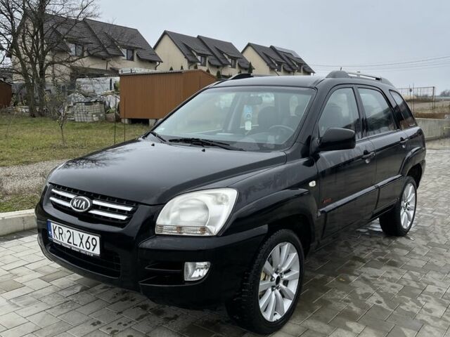 Чорний Кіа Sportage, об'ємом двигуна 2 л та пробігом 257 тис. км за 3472 $, фото 1 на Automoto.ua