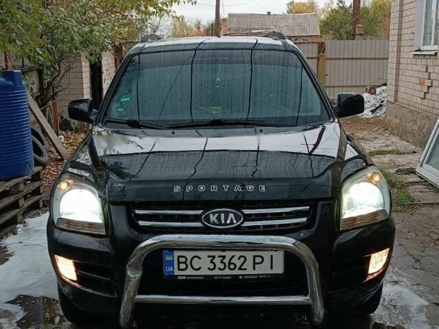 Черный Киа Sportage, объемом двигателя 2 л и пробегом 187 тыс. км за 7500 $, фото 1 на Automoto.ua