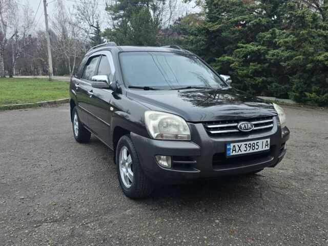 Чорний Кіа Sportage, об'ємом двигуна 2 л та пробігом 207 тис. км за 7000 $, фото 1 на Automoto.ua